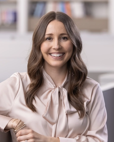 portrait of a smiling person in professional attire